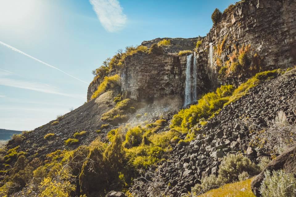 A view of the waterfall and surrounding landscape at Mermaid Cove near Jerome, Idaho.