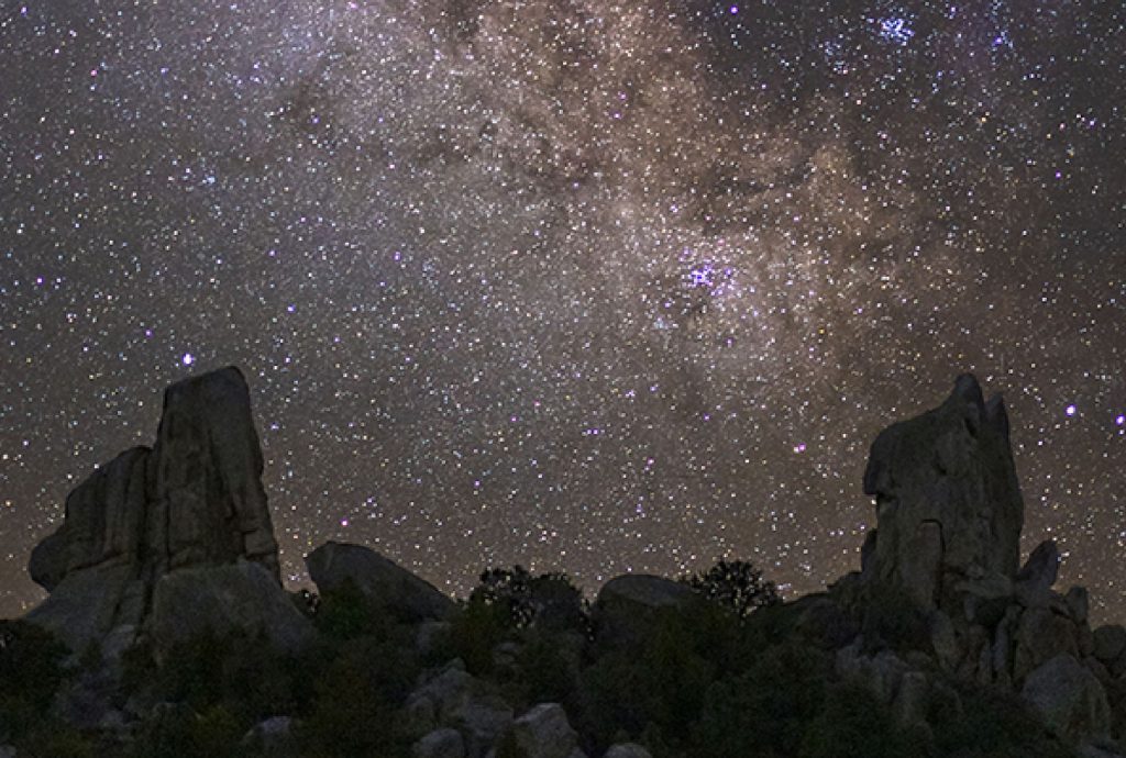 A sparkling starlit night sky dazzles above the City of Rocks.