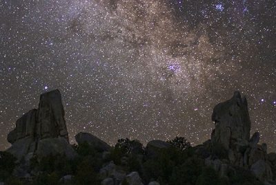 A sparkling starlit night sky dazzles above the City of Rocks.