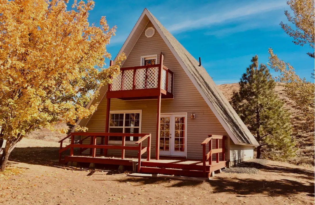 The exterior of West Side Mountain View Cabin in the fall.