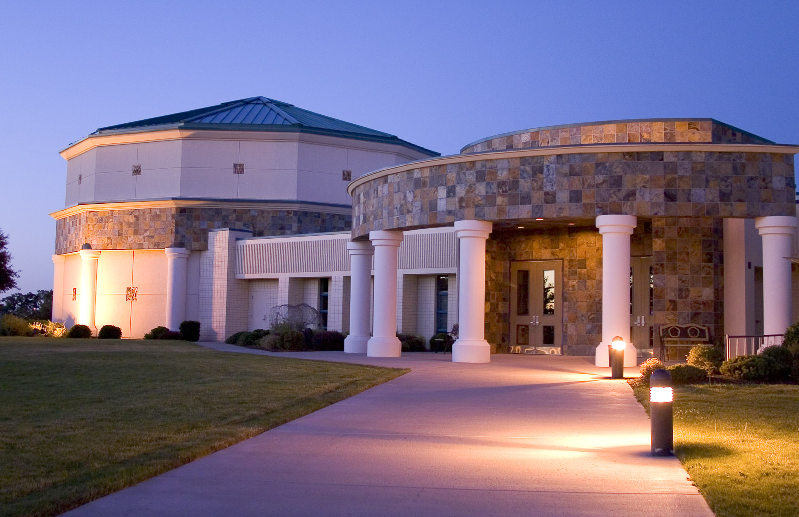 The exterior of the Herrett Center at the College of Southern Idaho at dusk.