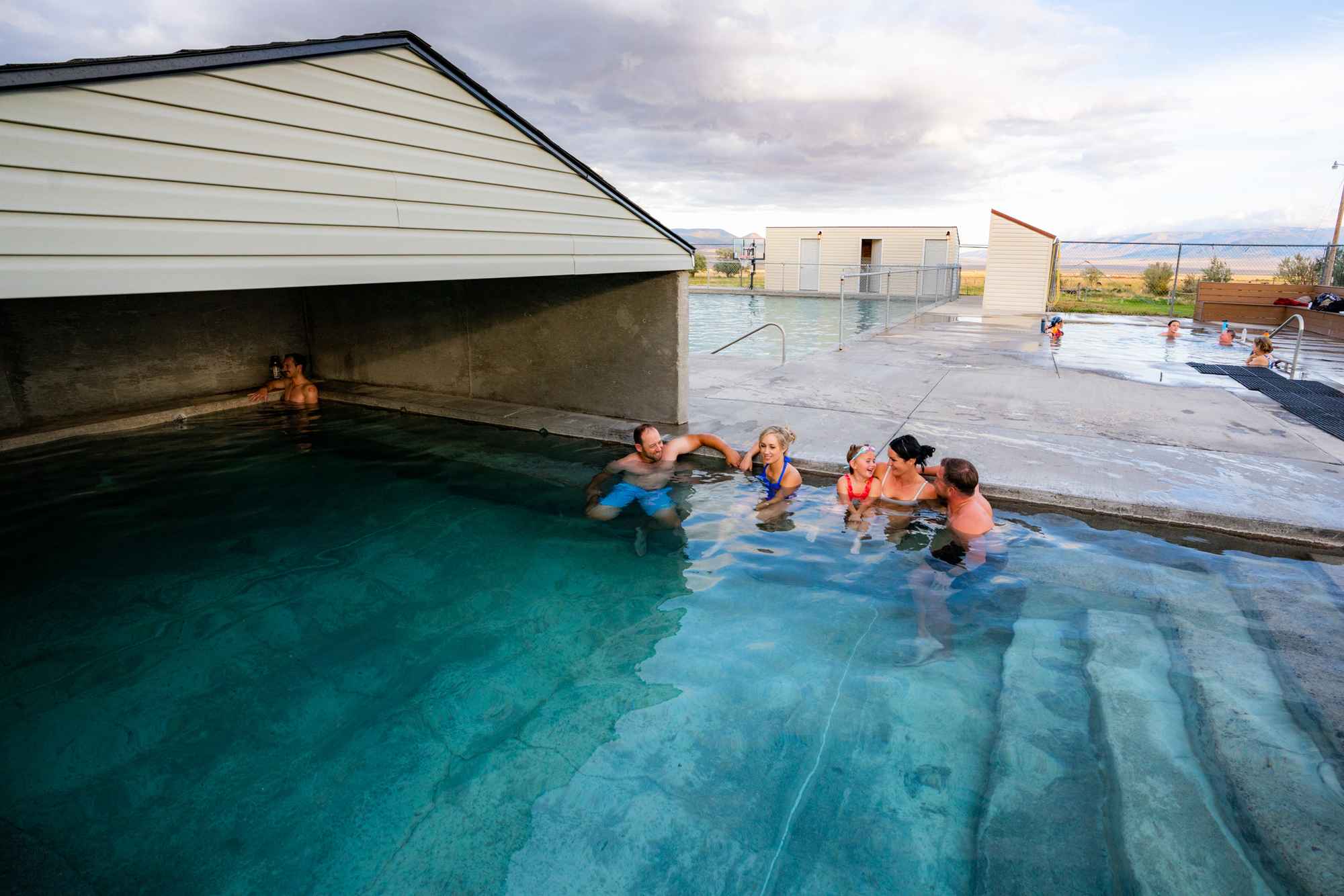 A group of people in the hot springs.