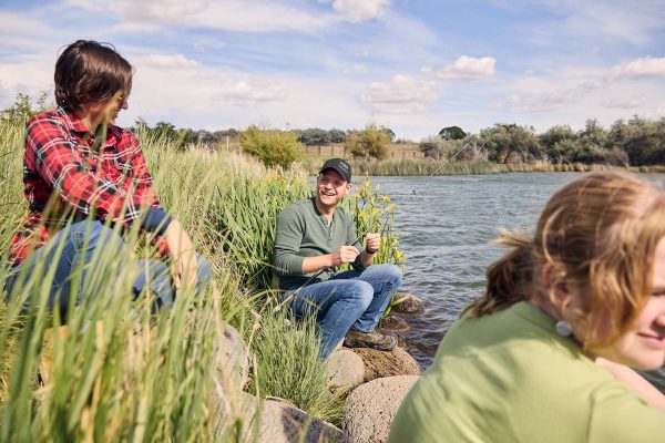 Three people fishing at the Hagerman Wildlife Management Area.