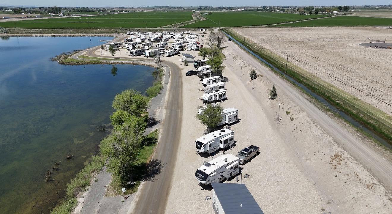 Lucky Lake 208 RV Park & Cabins next to a serene lake