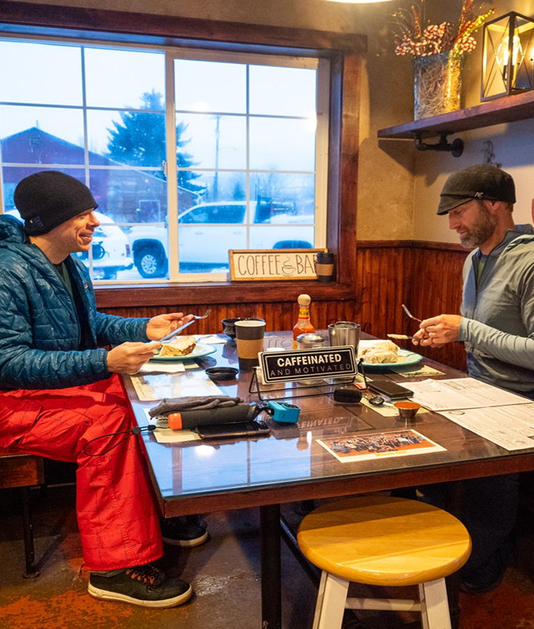 Two men enjoy breakfast at a local Fairfield, Idaho coffee shop known as Mushers Mug.